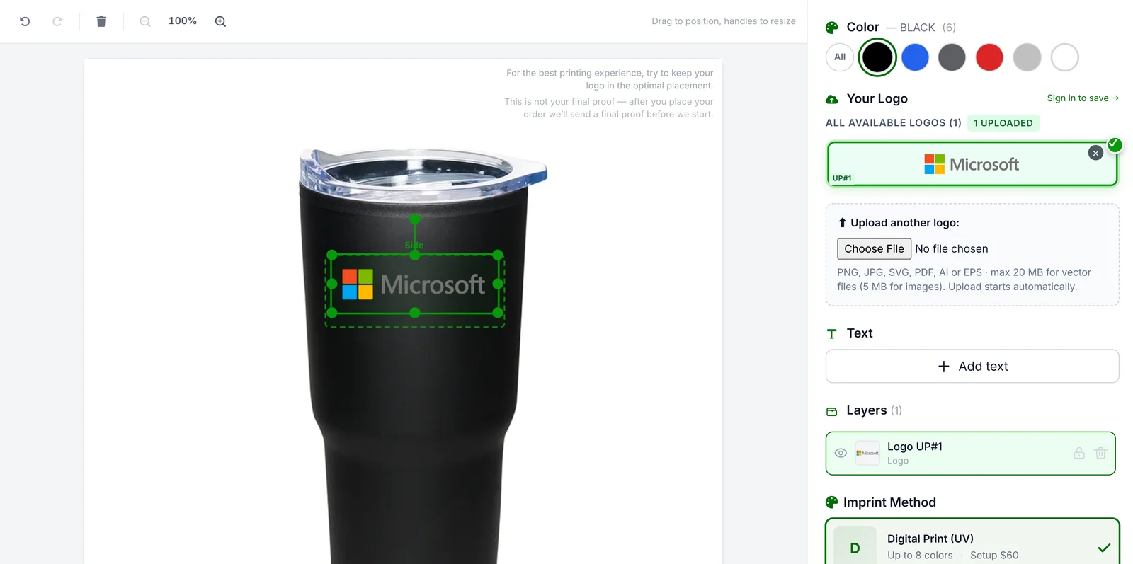 The Microsoft logo centered inside the dashed imprint area mapped for the black Streetwise tumbler, with green resize handles