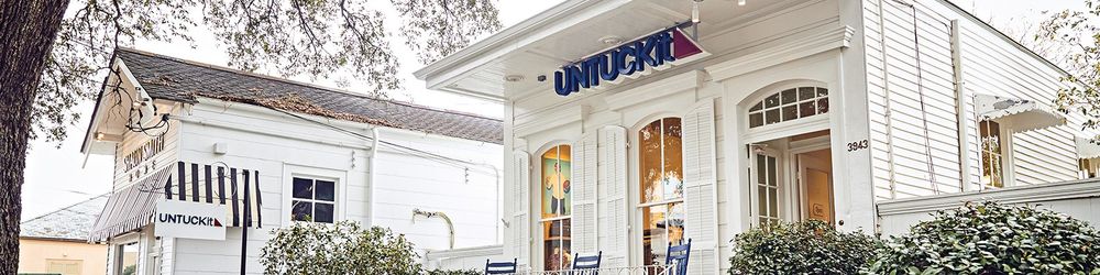 UNTUCKit brand banner